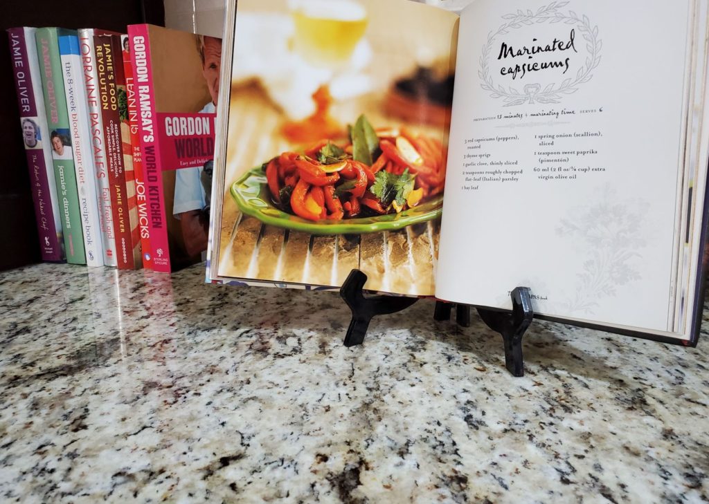 Cookbooks displayed on kitchen countertops