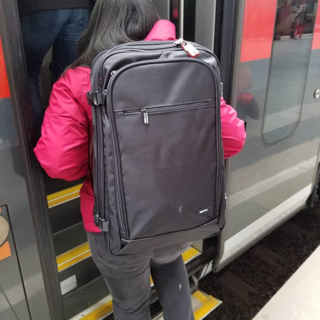 Monique Abbott with backpack at Vienna Haupbahnhof Train Station, Vienna, State of Vienna, Austria.