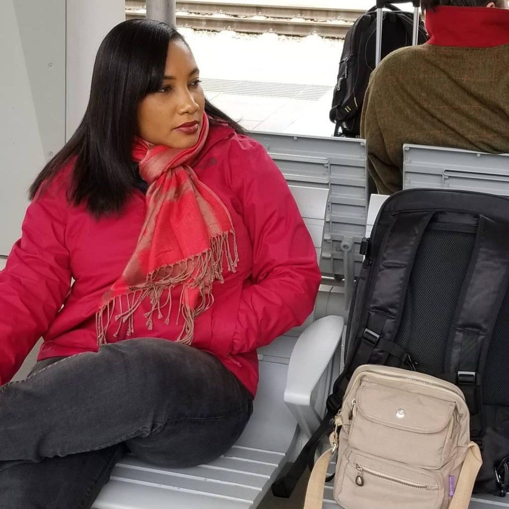 Monique Abbott with backpack at Vienna Haupbahnhof Train Station, Vienna, State of Vienna, Austria.