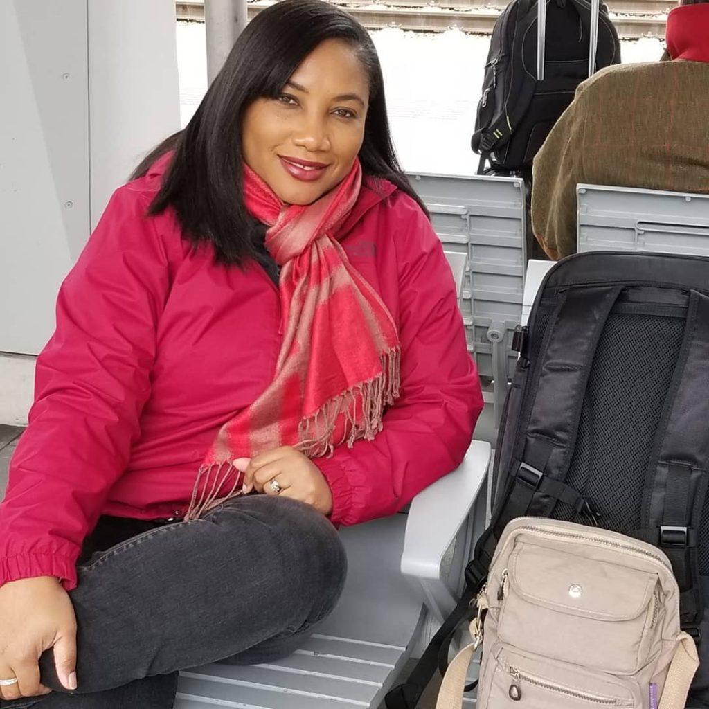 Monique Abbott with backpack at Vienna Haupbahnhof Train Station, Vienna, State of Vienna, Austria.