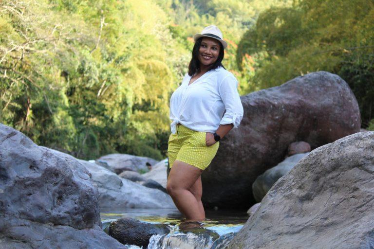 Monique Abbott standing in the Wag Water River at Castleton Gardens, Jamaica
