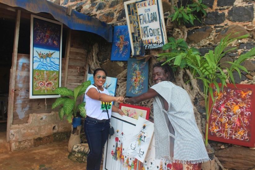 Monique Abbott interacting with in an Artist in Senegal Art District