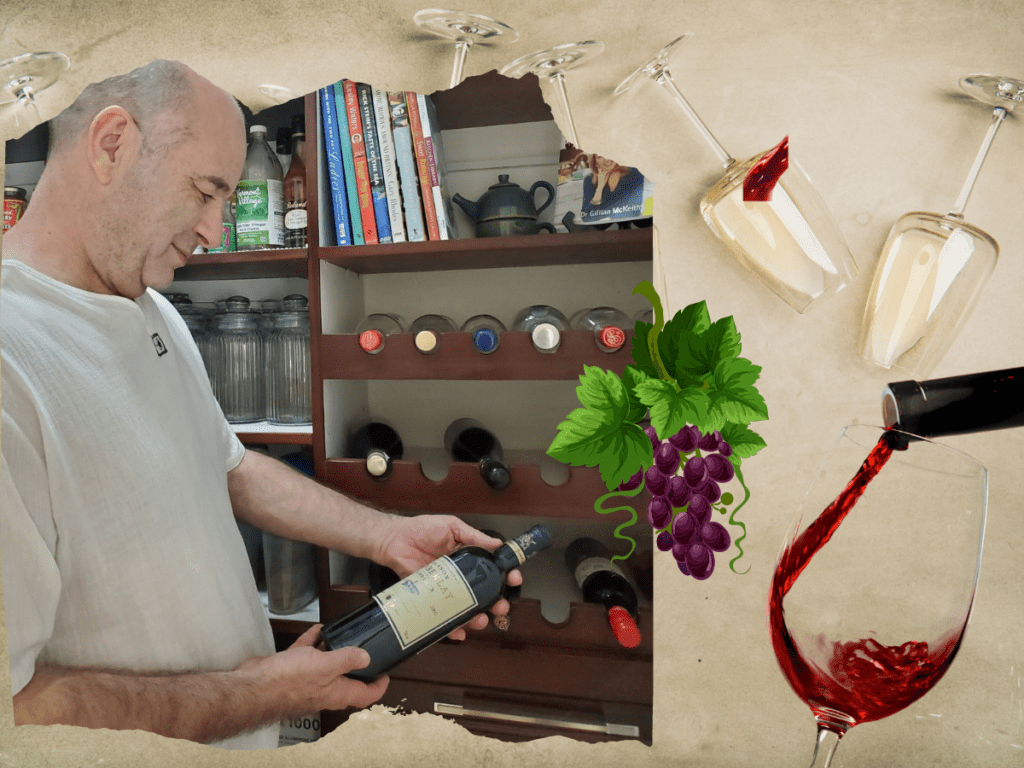 Nick Abbott selecting a bottle of wine from his newly designed pantry