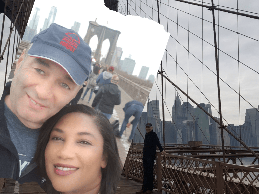 Nick and Monique Abbott standing on the Brooklyn Bridge