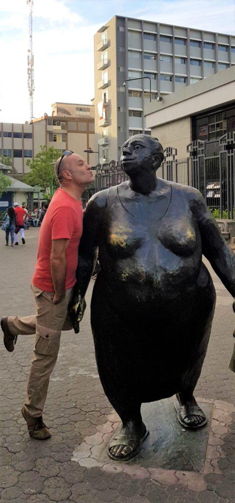 Nick Abbott Kissing a Statue in San Jose, Costa Rica