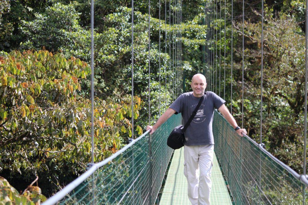 Nick Abbott standing on Suspension Bridge at Monteverde Cloud Forest, Costa Rica