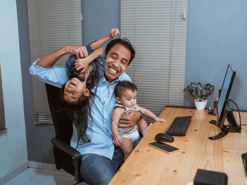 Man trying to work from home but distracted by children