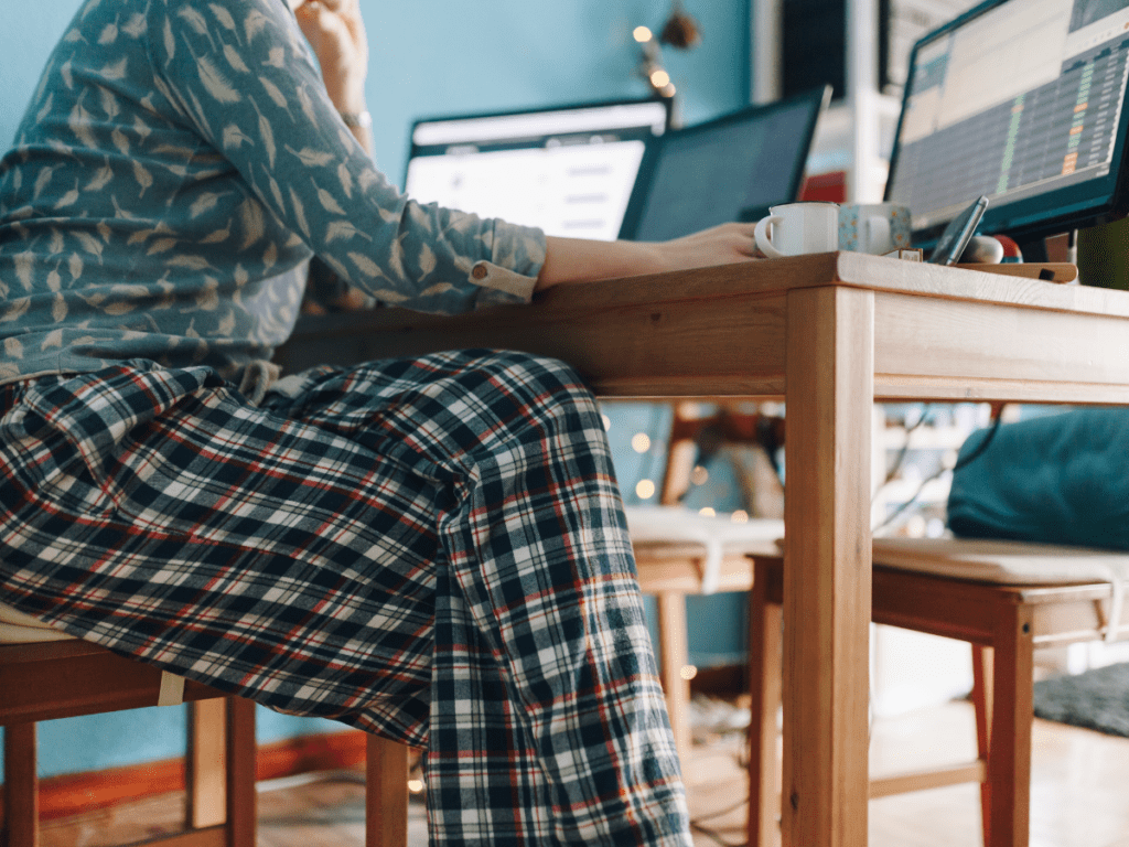 Woman working from home in pajamas