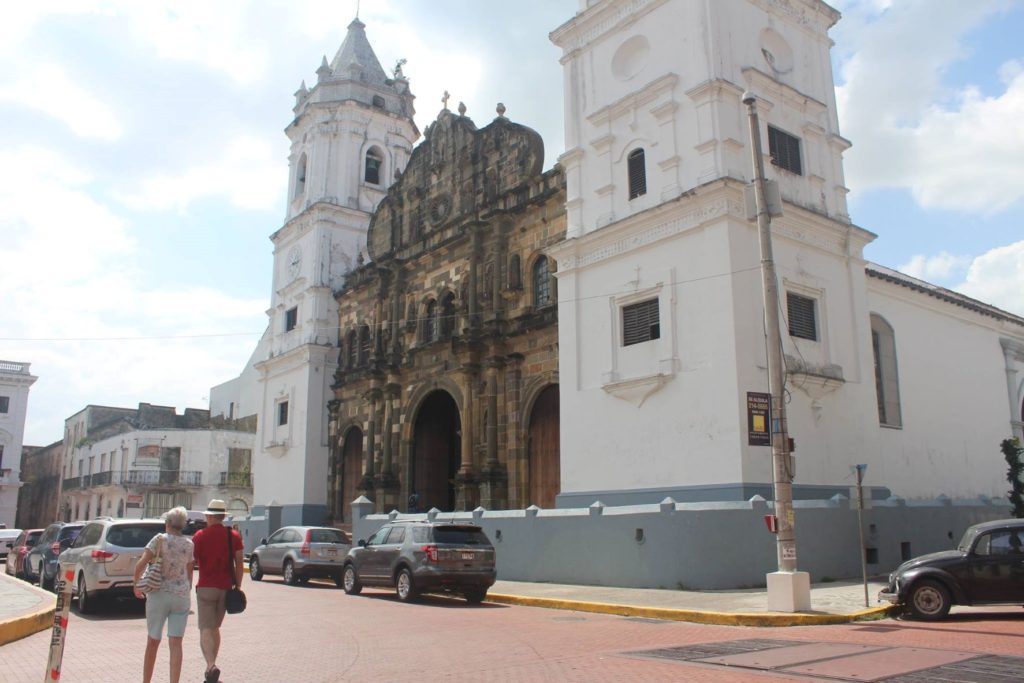 Nick & Jane Abbott walking by Cathedral Metropolitan, Old Town Panama