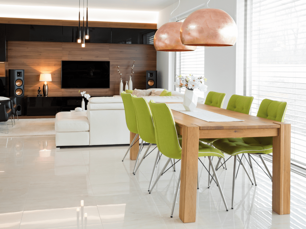 Modern Dining Room with High Table and Green Chairs and overhead Pendant Lights