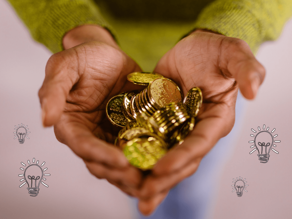Man holding coins in their hands