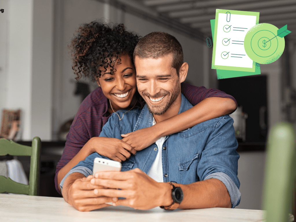 Female hugging male partner while they look at phone together